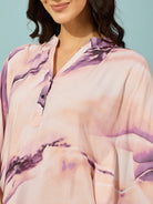 Comfortable and elegant purple marble print kaftan, featuring button placket and loose fit.
