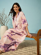 Graceful purple marble print kaftan with a mandarin collar, perfect for any event.
