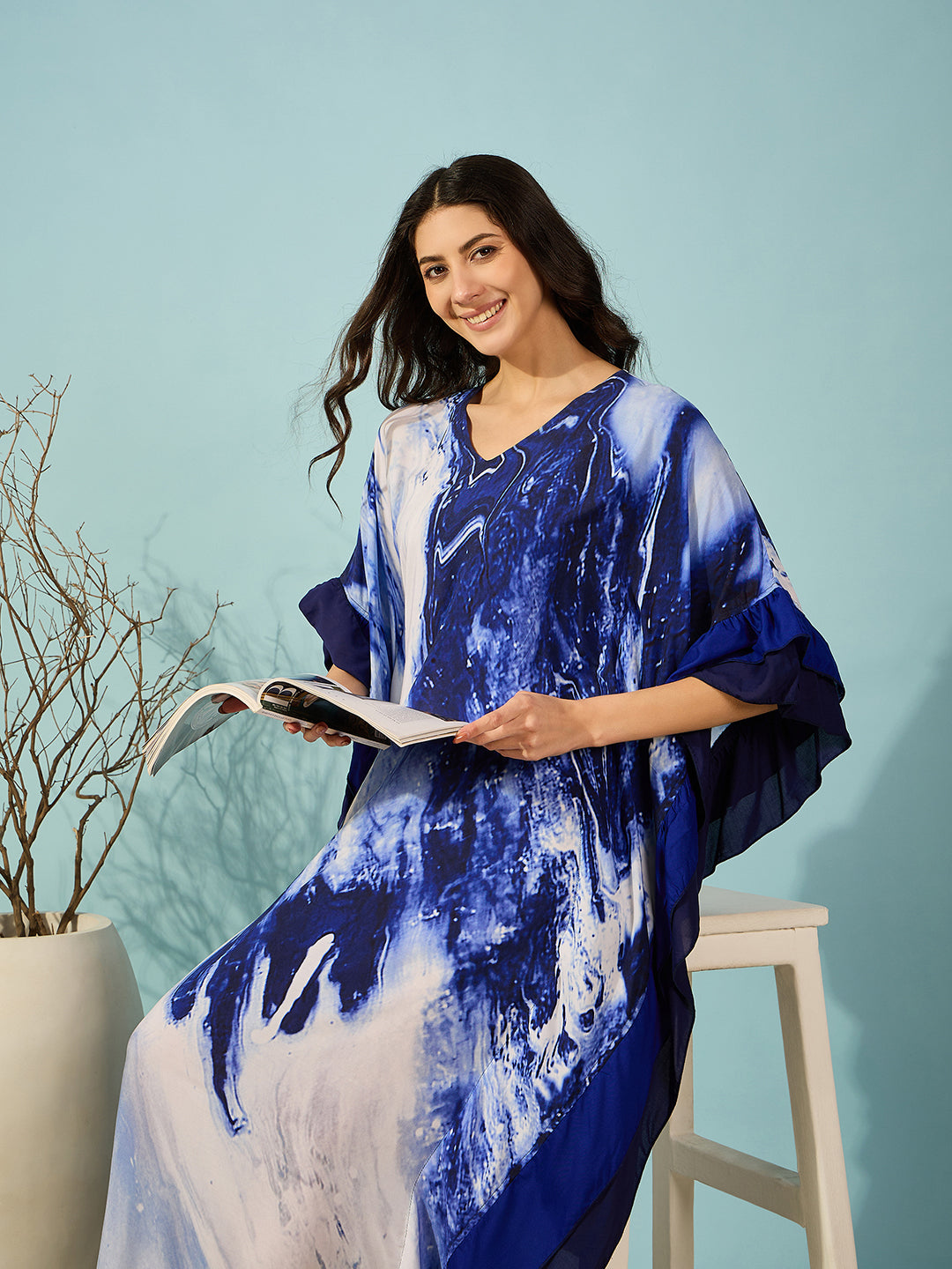 Women's slim fit blue marble print kaftan, great for lounging and casual outings.
