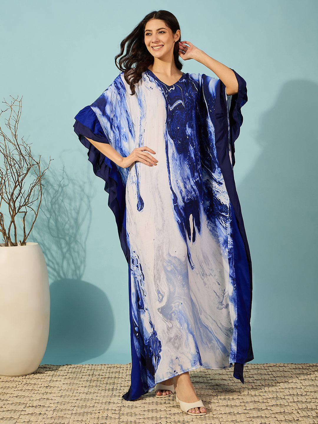 Women's blue marble kaftan nightdress with stylish double-color ruffle details, ideal for comfortable evenings.
