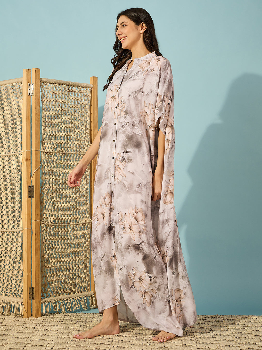 Flowing pleated maxi length kaftan nightdress in marble floral print, perfect for any occasion with a relaxed fit.
