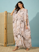 Stylish marble floral kaftan with soft pleats, offering an effortless blend of comfort and elegance.
