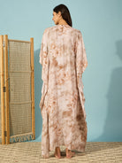 Relax in this marble floral pleated kaftan, designed for style and ease with a flattering flow.
