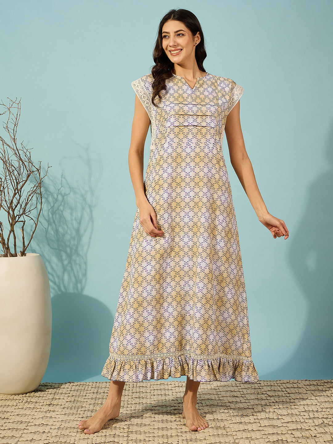 Relax in style with this women's yellow maxi-length night dress crafted from premium cotton.
