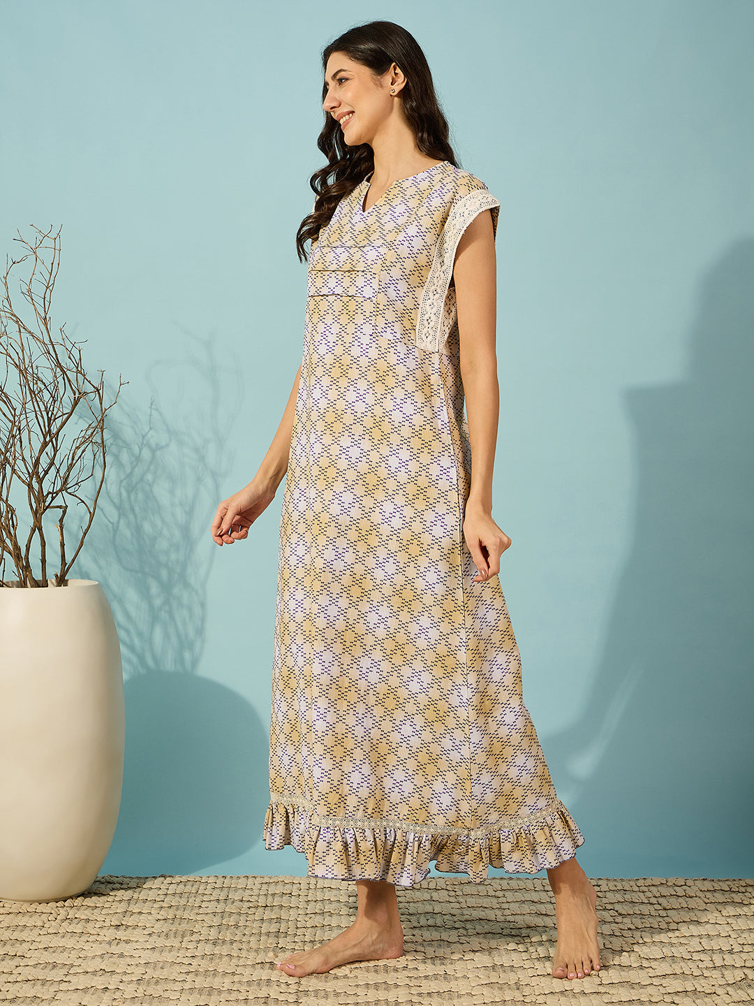 Lightweight yellow cotton night dress for women - maxi-length design with elegant hatch stitch details.
