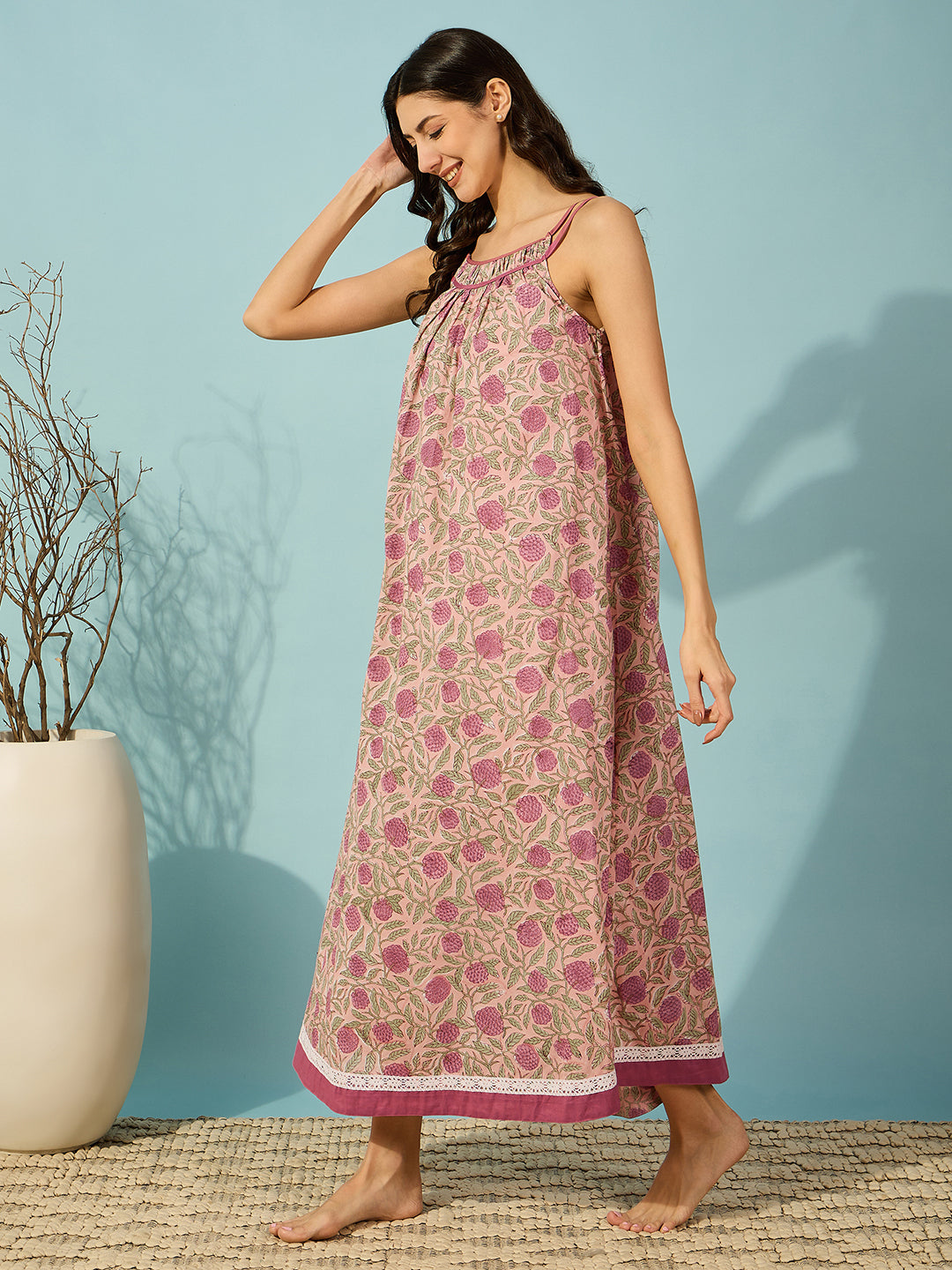 Elegant pink cotton negligee featuring a beautiful floral block print, ideal for your nighttime routine.
