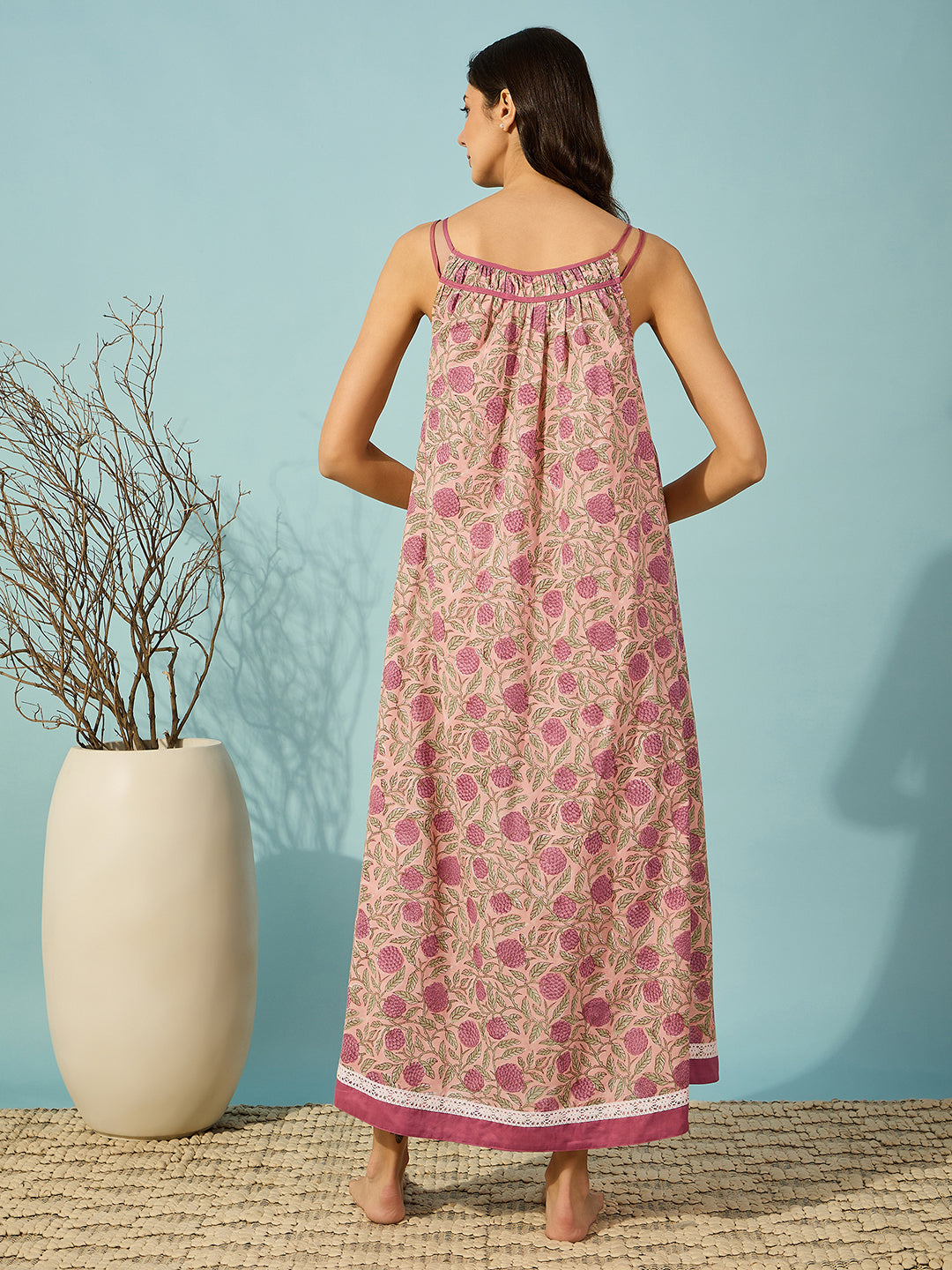 Soft cotton pink negligee with intricate floral block print, perfect for evening relaxation.
