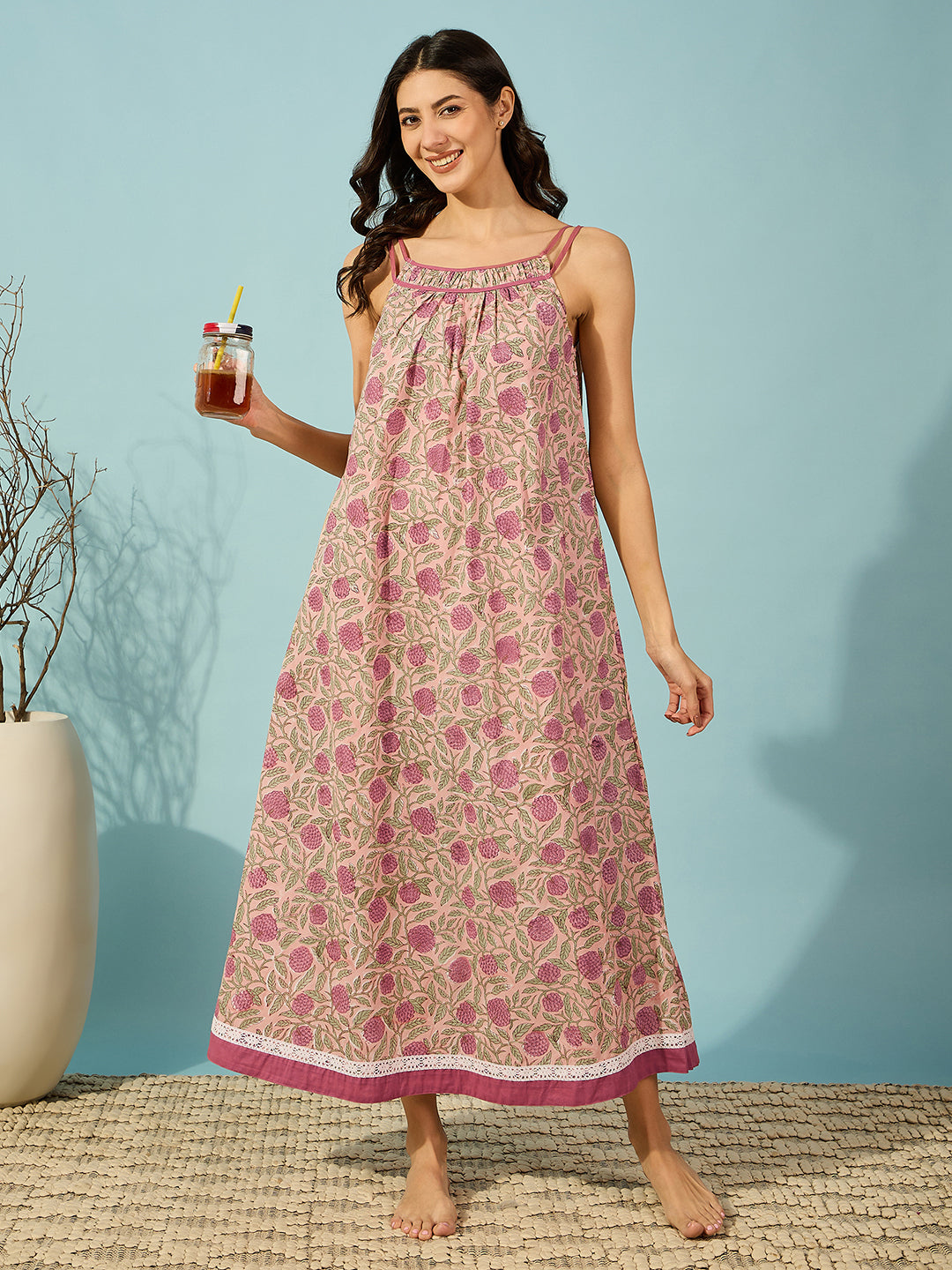 Charming pink floral cotton negligee with delicate lace details, designed for ultimate comfort.
