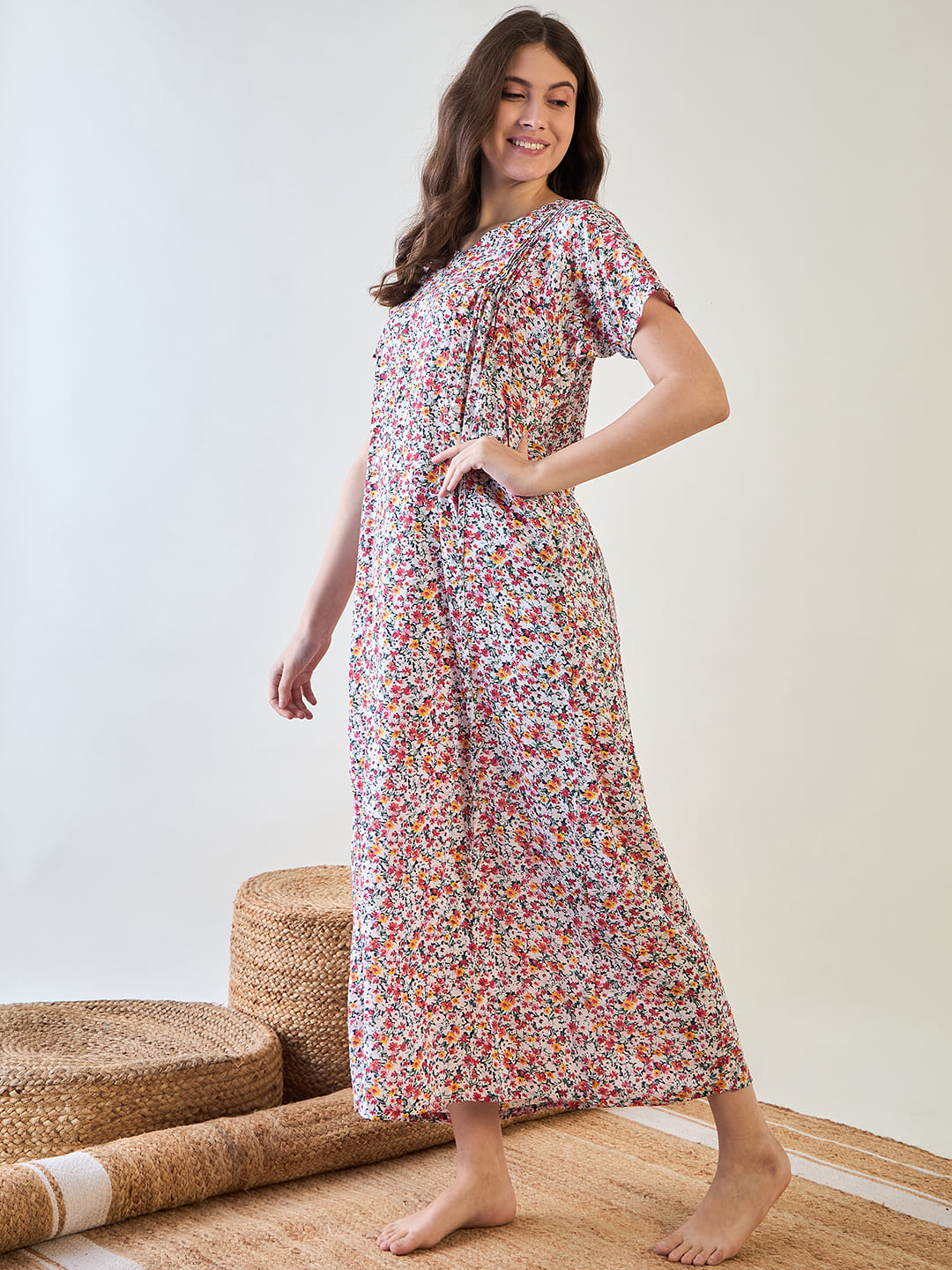 Comfortable and stylish cotton nightdress with red floral patterns.