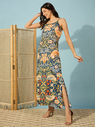 Blue vintage floral slip nightdress with adjustable straps and lace detailing for a chic, restful sleep.
