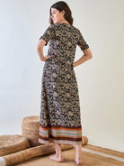 Comfortable rayon nightdress with a round neck and button detail.