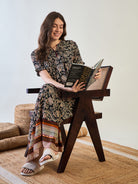 Soft and breathable rayon nightdress in slim fit with short sleeves.