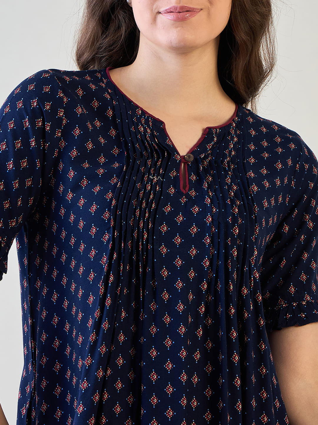 Navy starlight night dress featuring a flattering flared shape.
