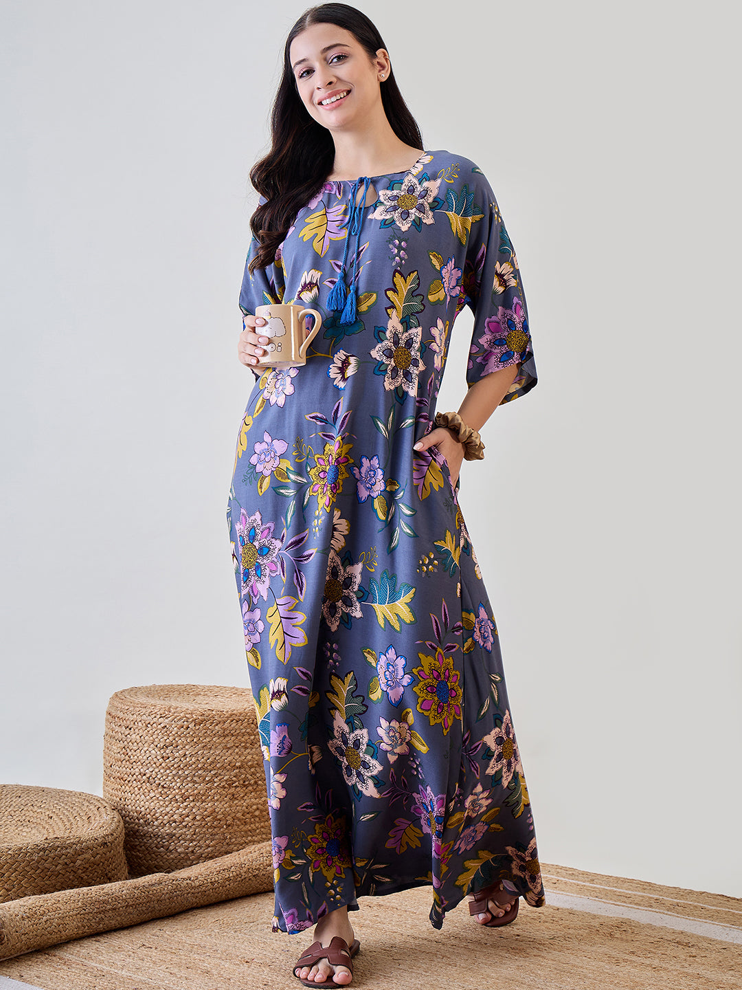 Soft modal flowy nightdress with an abstract floral print, designed for a relaxed and stylish bedtime experience.
