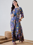 Soft modal flowy nightdress with an abstract floral print, designed for a relaxed and stylish bedtime experience.
