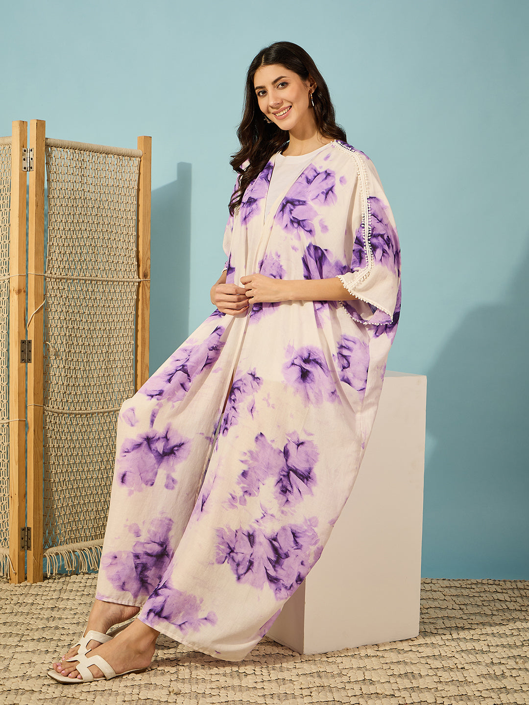 Effortlessly cool purple tie-dye coverup with open front and lace details, perfect for resort wear.
