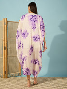Charming purple tie-dye coverup with lace detailing, perfect for a laid-back resort look.
