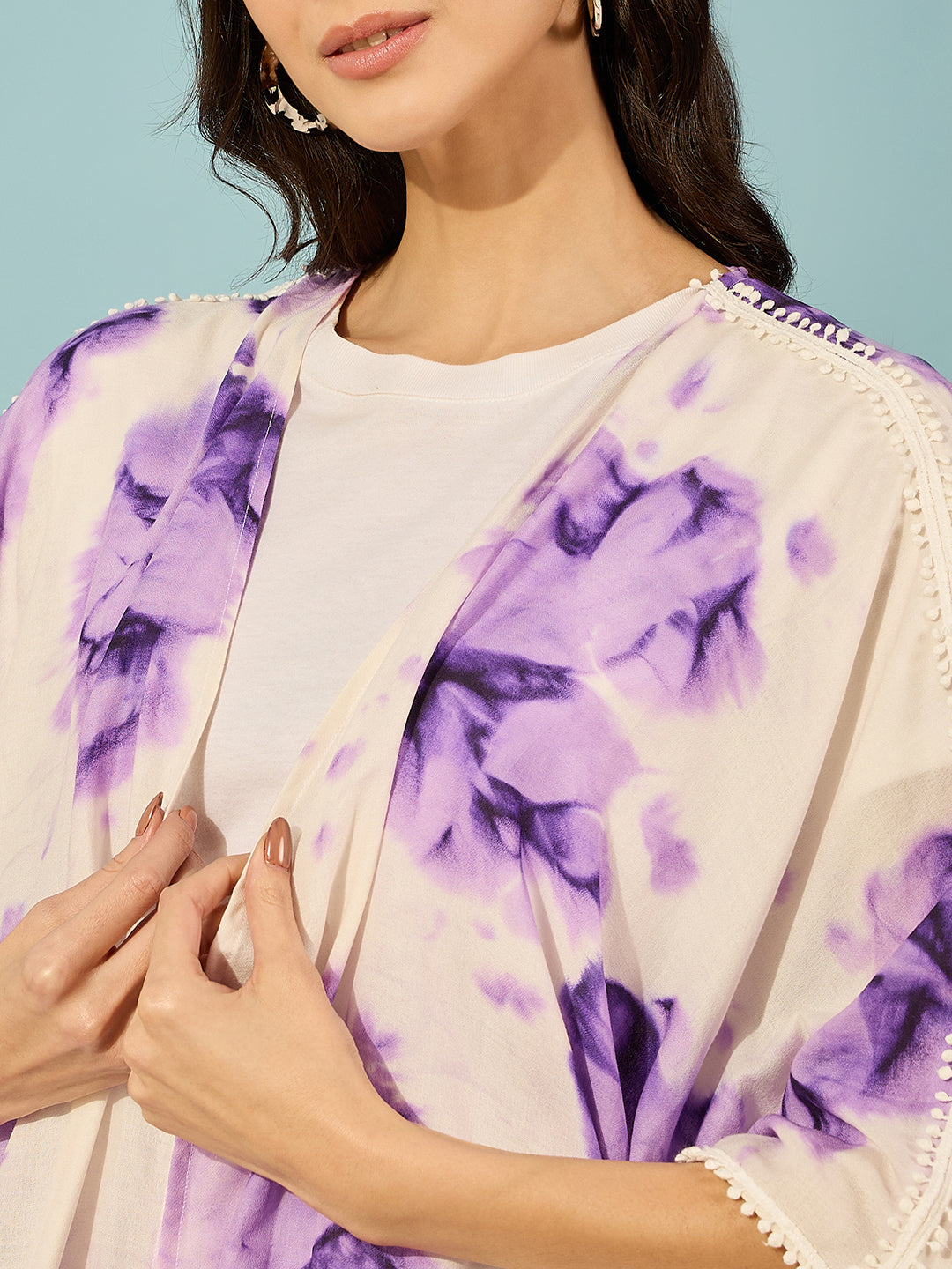 Stylish and breathable purple tie-dye coverup, ideal for a resort getaway or beachside relaxation.
