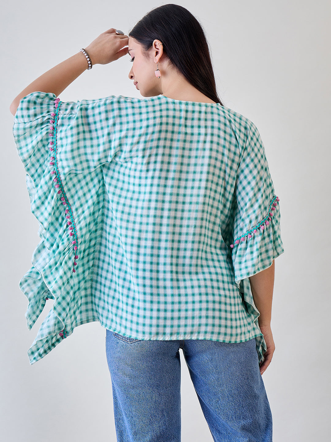 Add a fresh, stylish vibe to your outfit with the Green Gingham Floral Embroidered Kaftan Top
