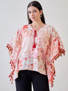 Beige and red pom-pom lace embellished cotton kaftan top, offering a chic and comfortable outfit option
