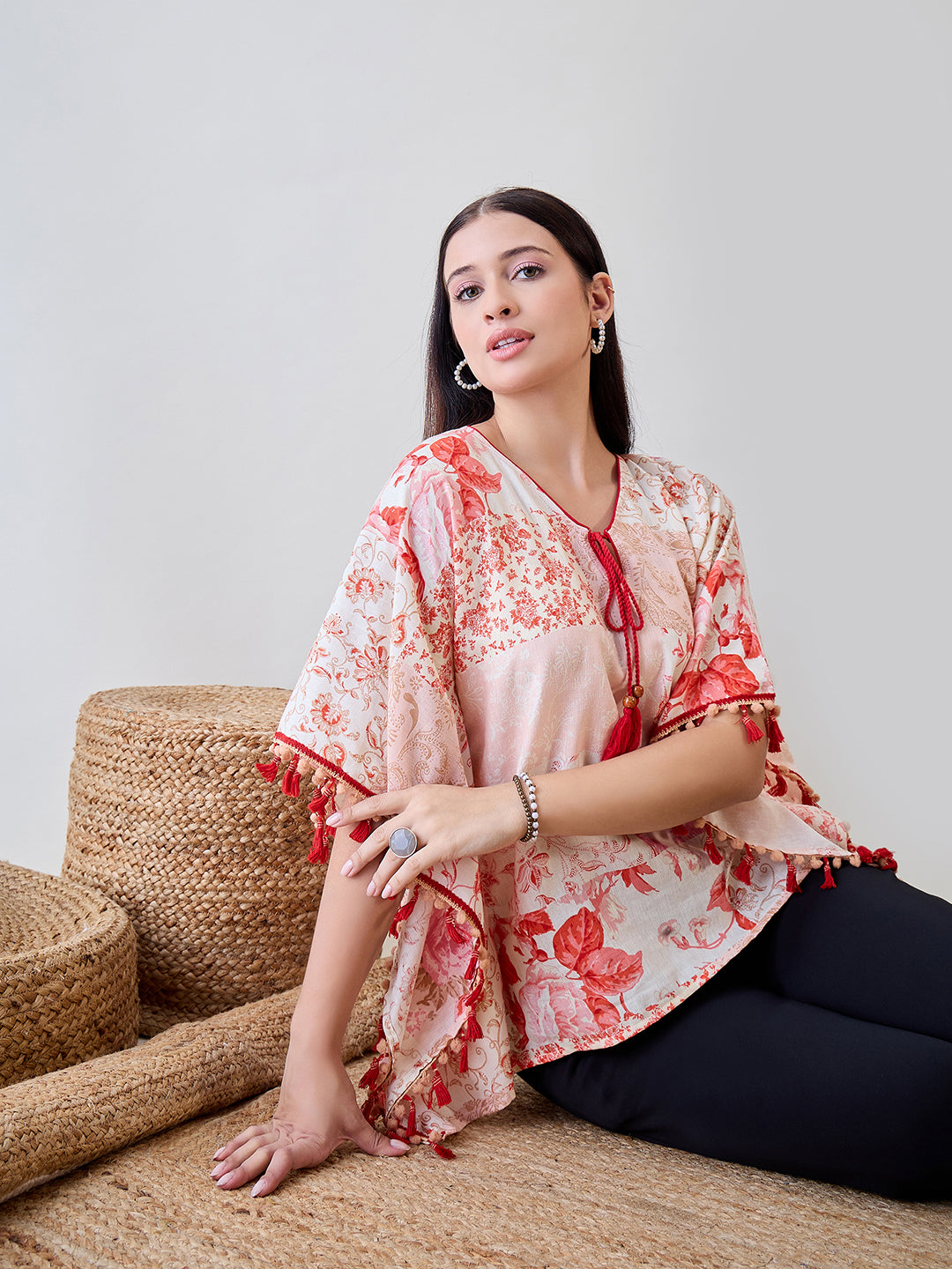 Beige and red pom-pom lace embellished kaftan top in soft cotton, designed for a relaxed yet trendy look.
