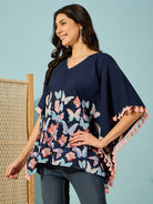 Relaxed-fit cotton kaftan top with butterfly motifs and playful tassels on sides - Stylish summer top.
