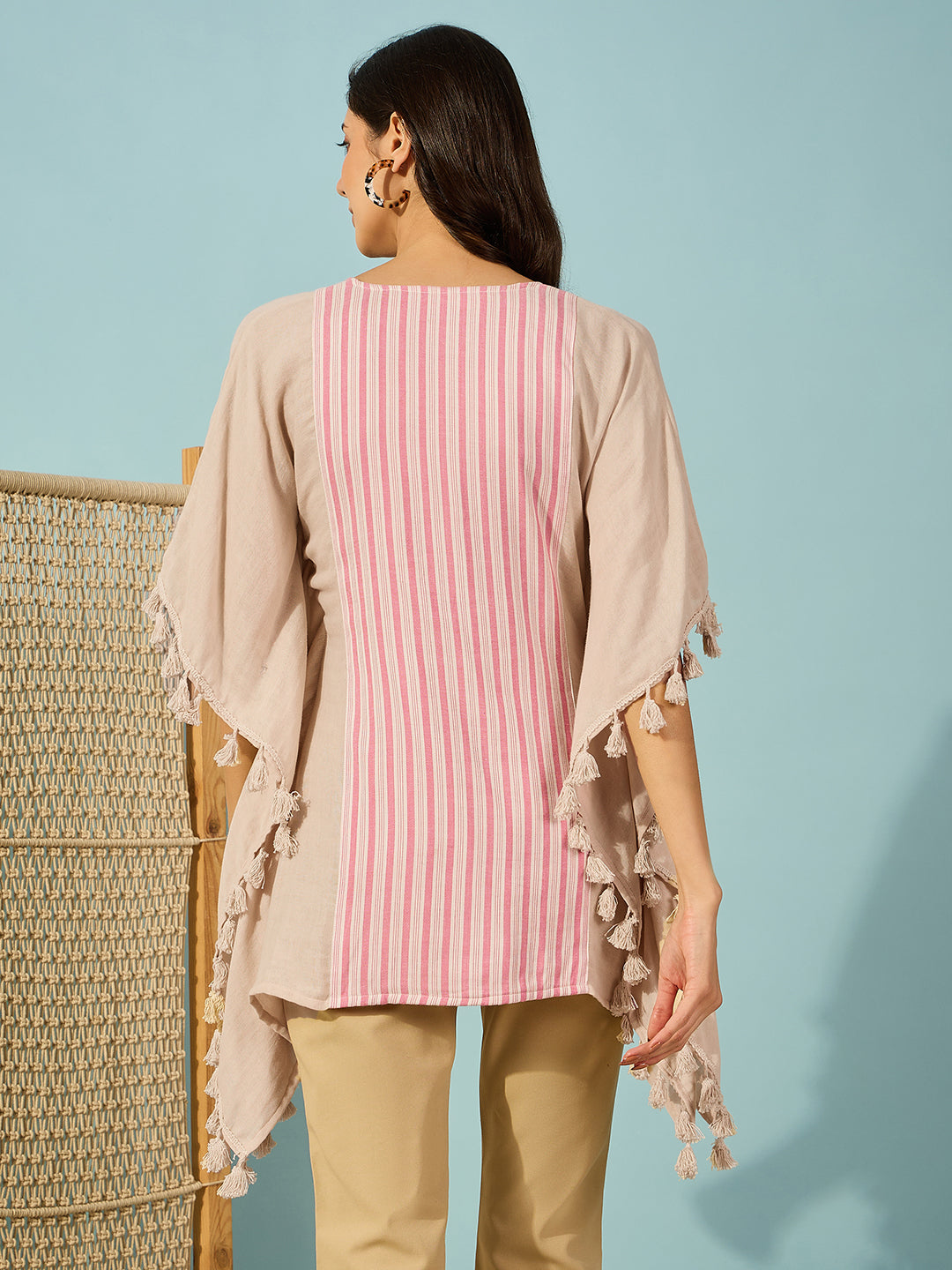 Sophisticated striped cotton kaftan for women, with tassel details and a flattering V-neck.
