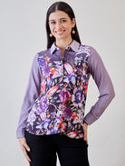 Purple painted printed crepe shirt with a button-down front and a relaxed fit, perfect for chic casual wear.
