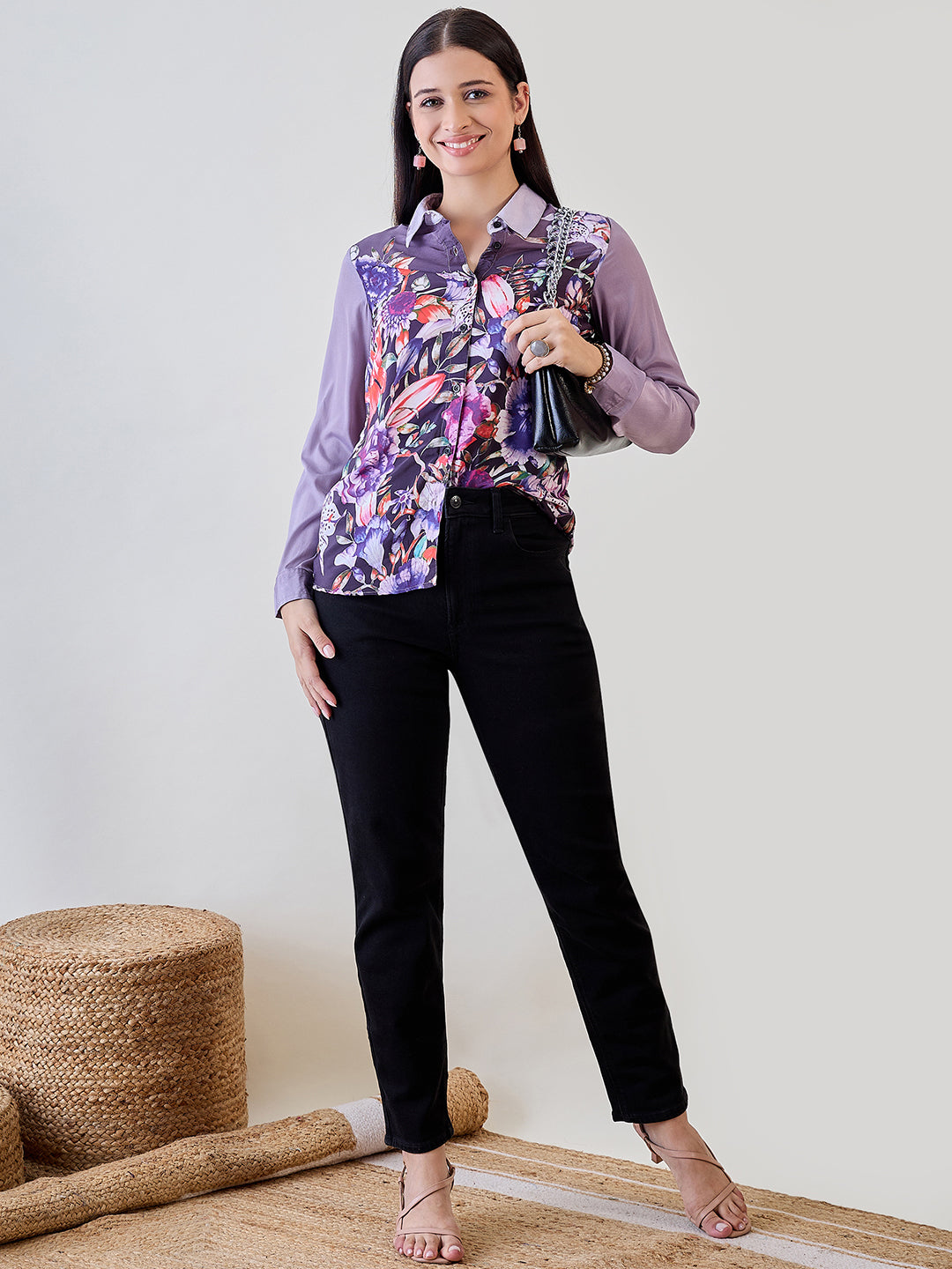 Lightweight purple crepe shirt featuring an abstract painted print and button-down closure for versatile styling.

