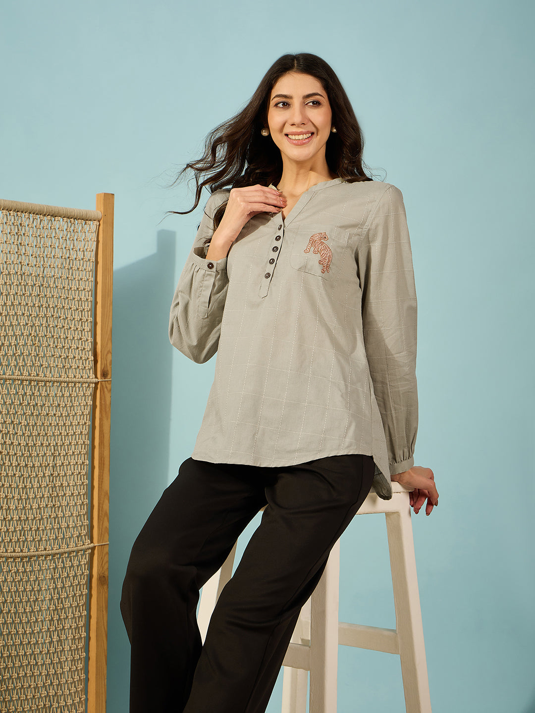 Olive green cotton shirt featuring bold tiger embroidery on the pocket, perfect for casual or semi-formal wear.

