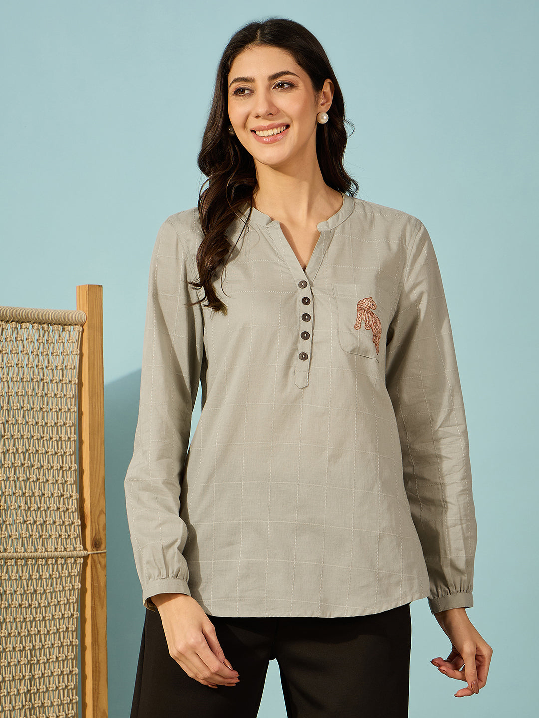 Trendy olive green shirt with tiger embroidery, designed for both casual outings and office wear.
