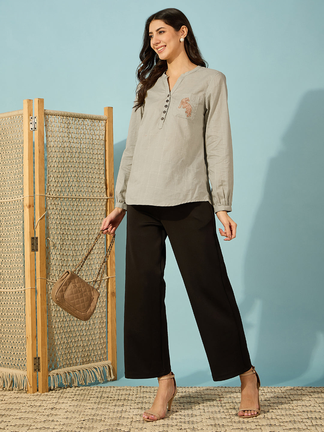 Stylish olive green cotton shirt with a slim fit and striking tiger embroidery, ideal for everyday elegance.
