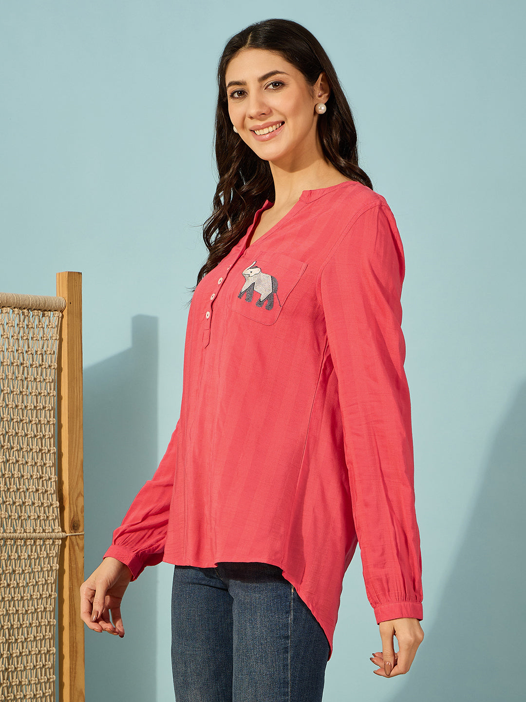 Elegant red cotton shirt with embroidered elephant design, perfect for casual outings.

