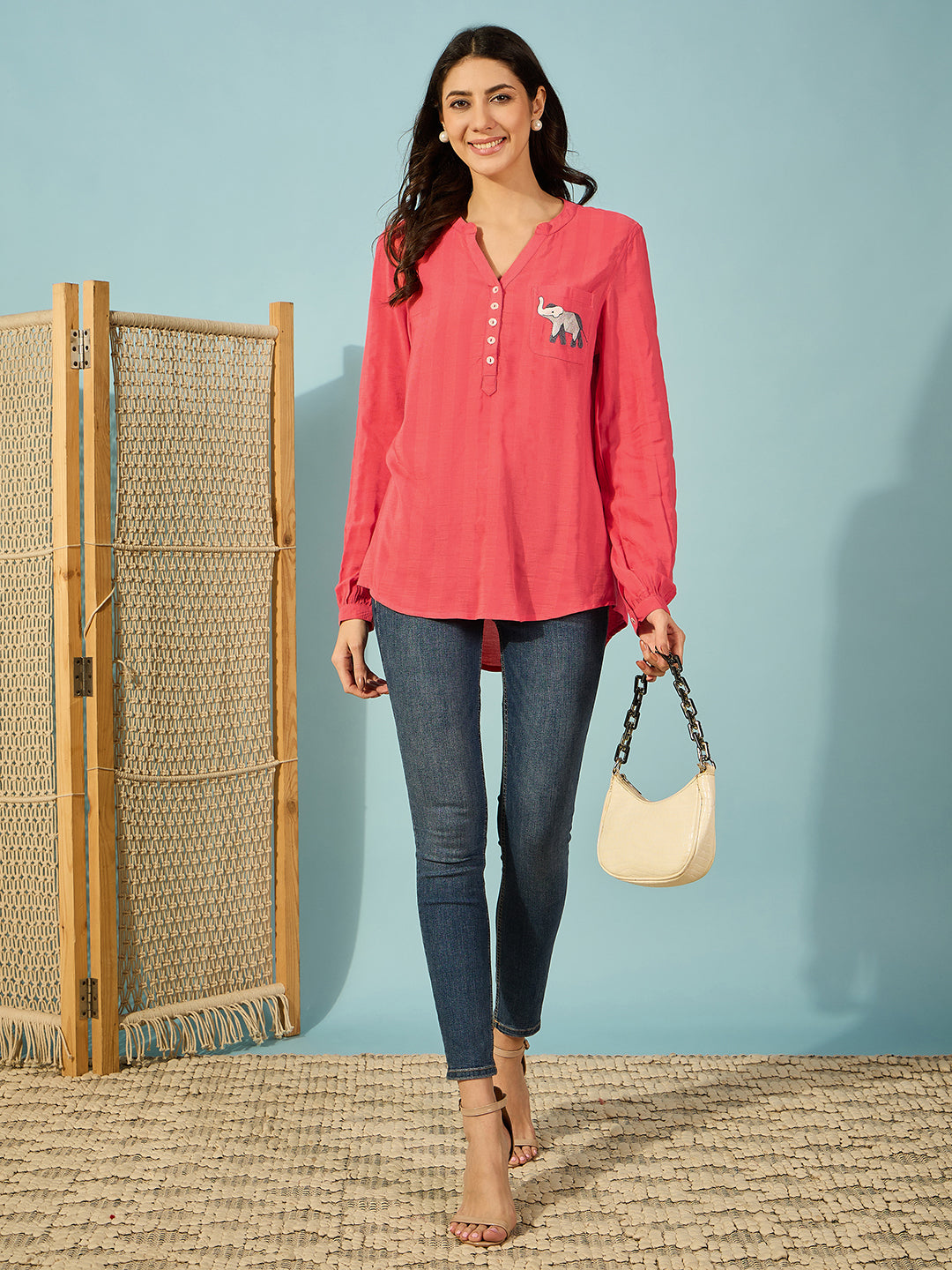 Trendy red shirt for women, featuring a mandarin collar and intricate elephant embroidery.
