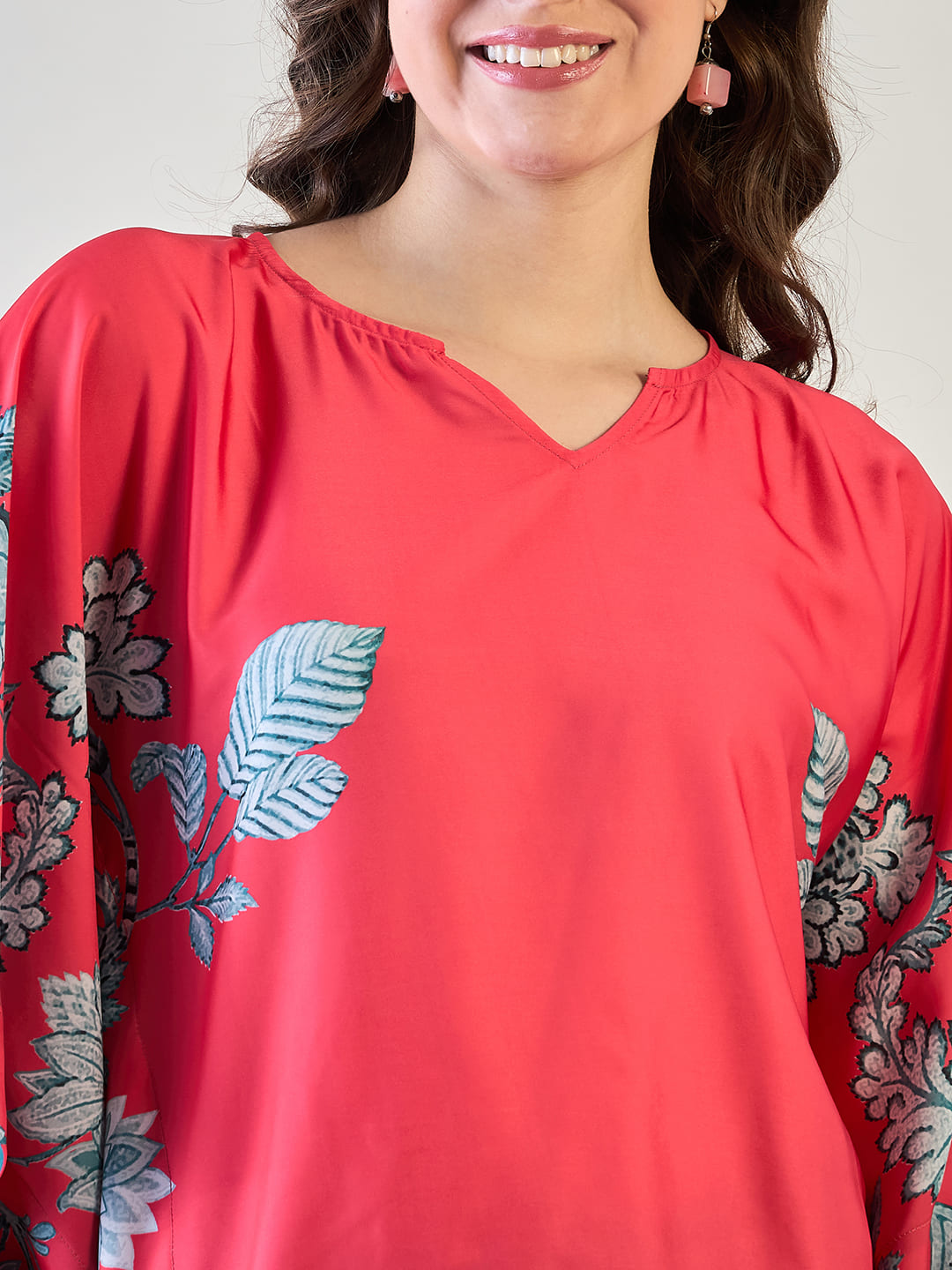 Trendy red floral kaftan designed for effortless style and comfort.