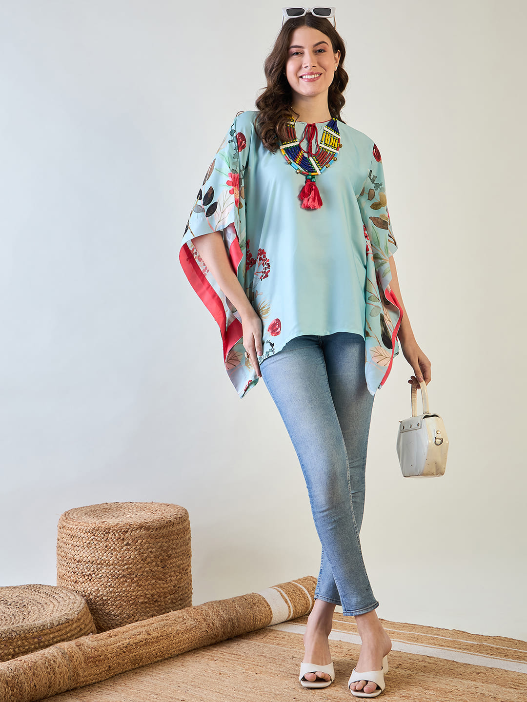 Sky blue floral kaftan top, ideal for casual and semi-formal occasions.