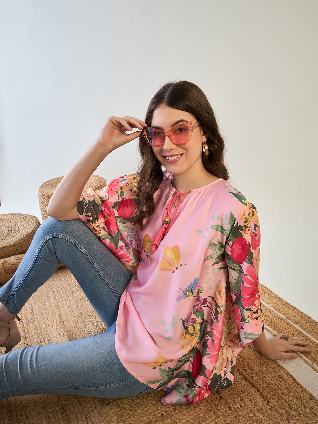 Lightweight, breathable poly satin fabric on the floral kaftan.