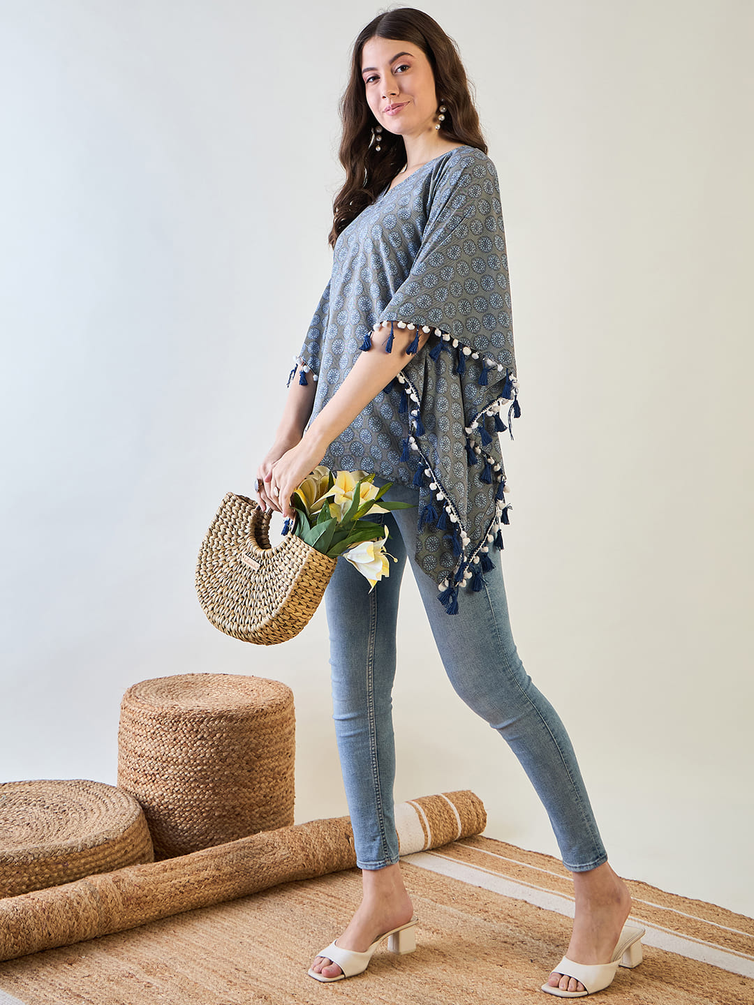 Elegant blue and grey circular print kaftan top with eye-catching tassels.
