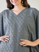 Lightweight blue printed kaftan top with a trendy V-neckline.