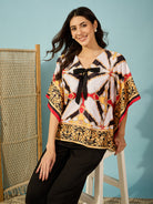 Elevate your style with a luxurious satin black kaftan top featuring intricate Baroque designs and a cute bow.
