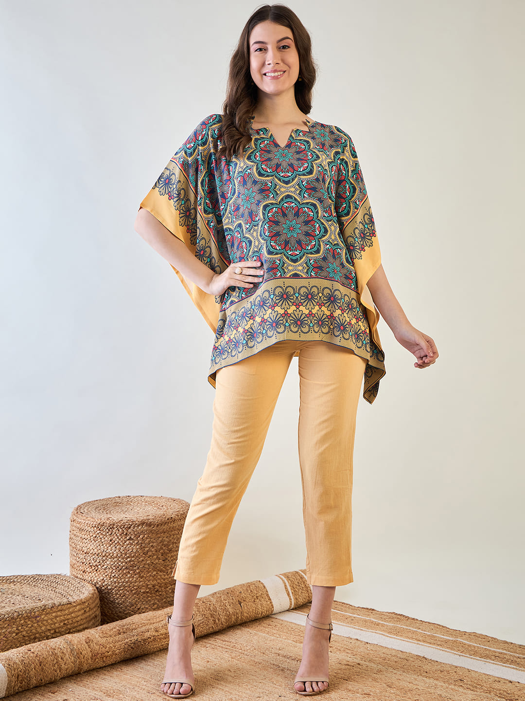 Floral Kaleido Kaftan Top in vibrant colors for a stylish look.