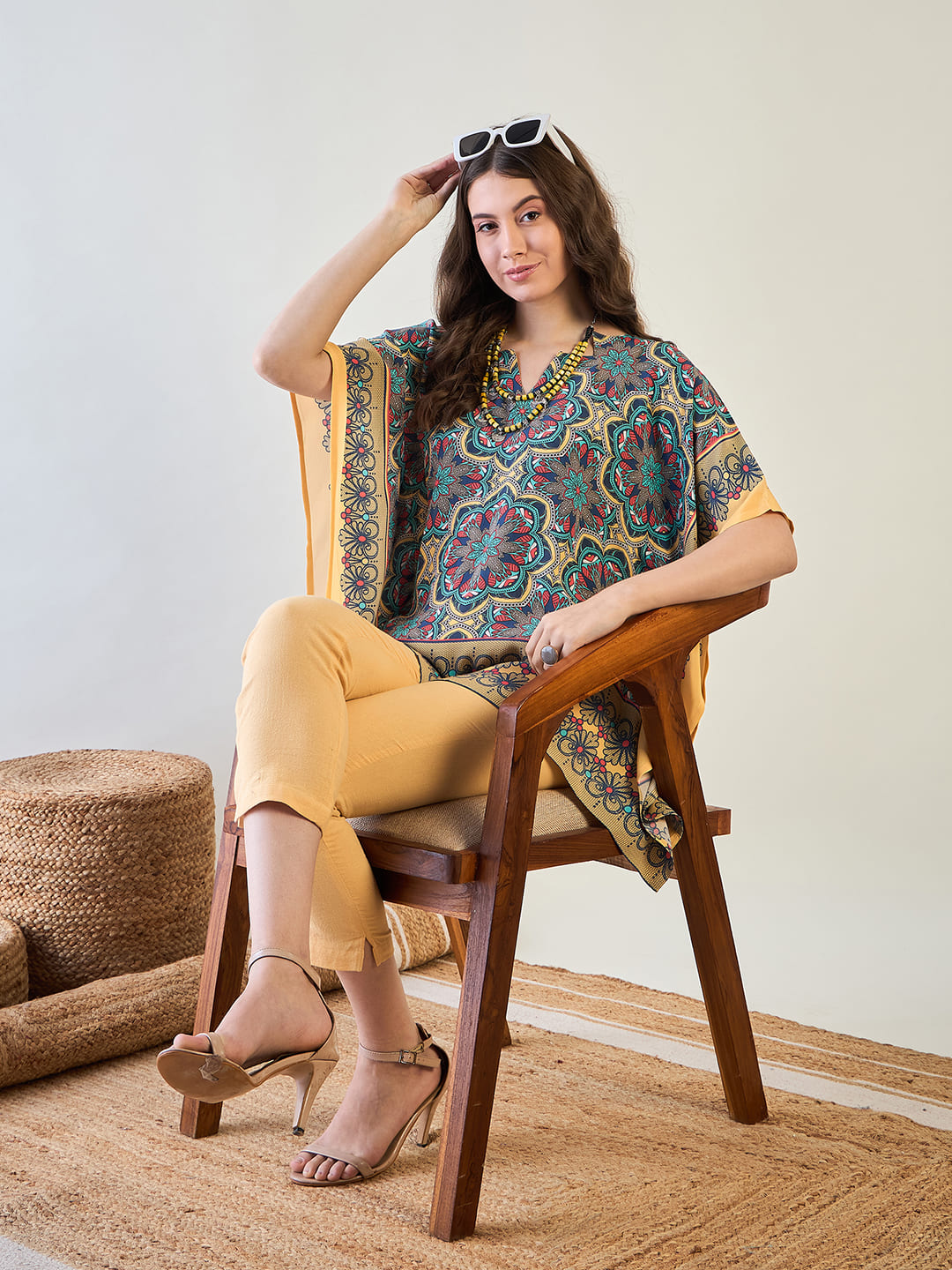 Lightweight Floral Kaleido Kaftan Top with flowing sleeves for ease of movement.