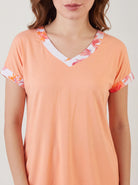 The Kaftan Company Pyjama Set Peach Solid Top with Tropical Floral Pyjama Set for Women