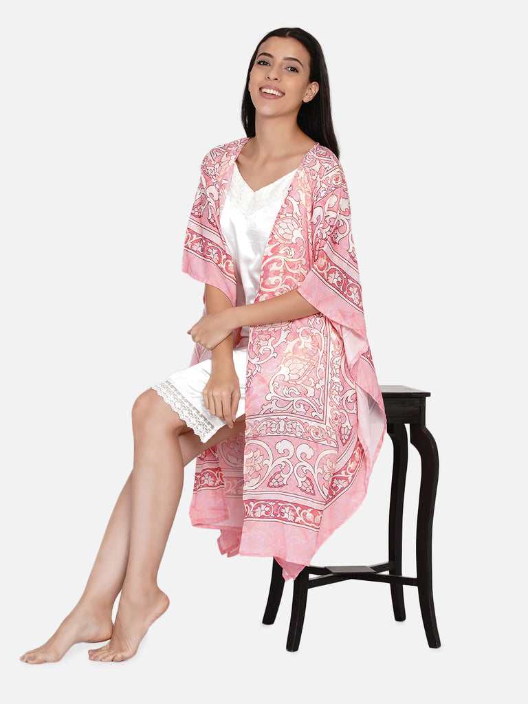 Pink ornamental print gown with complimenting white satin slip