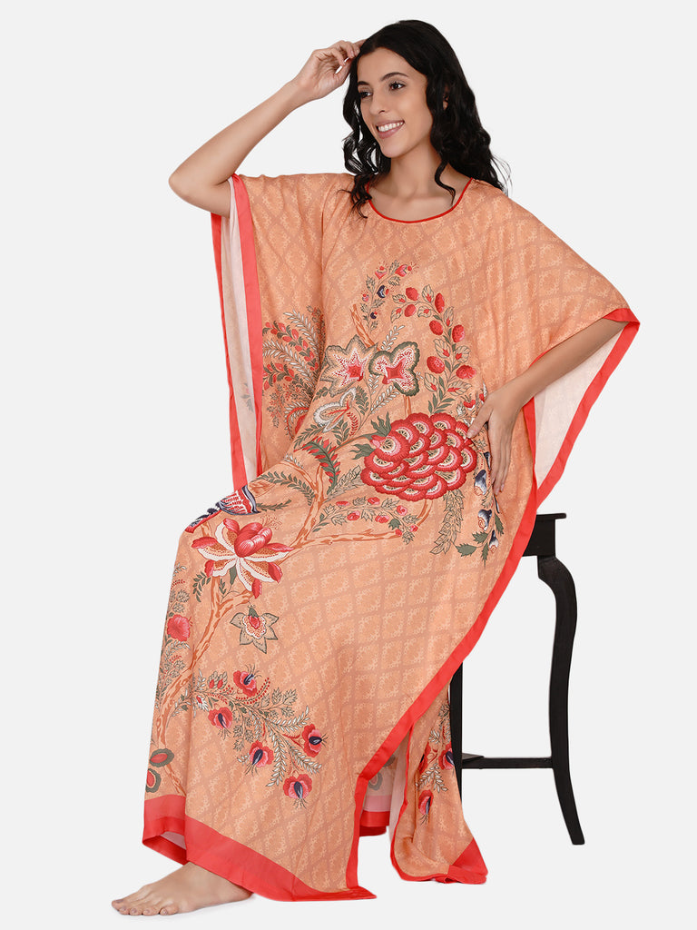 Orange patterned decorative floral print kaftan with complimenting red borders