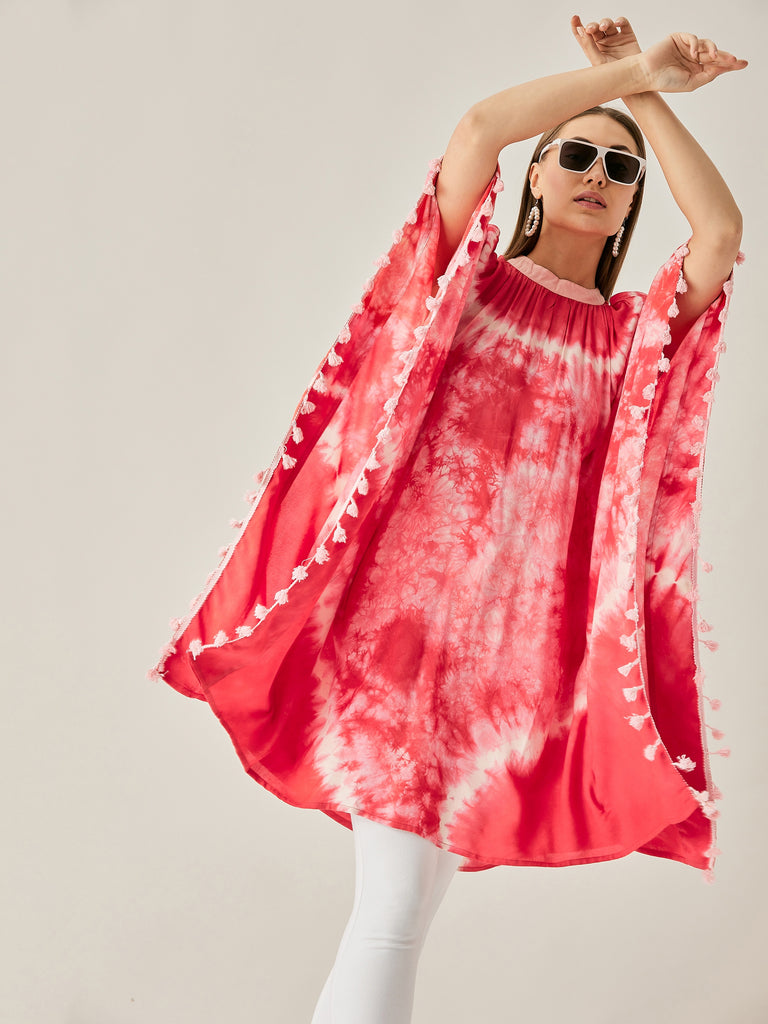 Red and white circular tie dye tunic with shoulder cut out detail and band collar